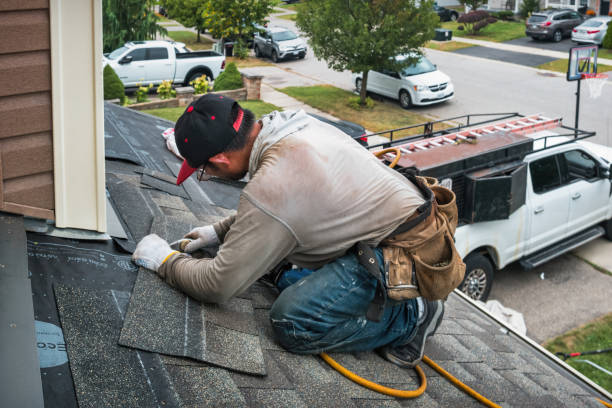 Professional Emergency Roof Repair technician working in Bloomington, IN